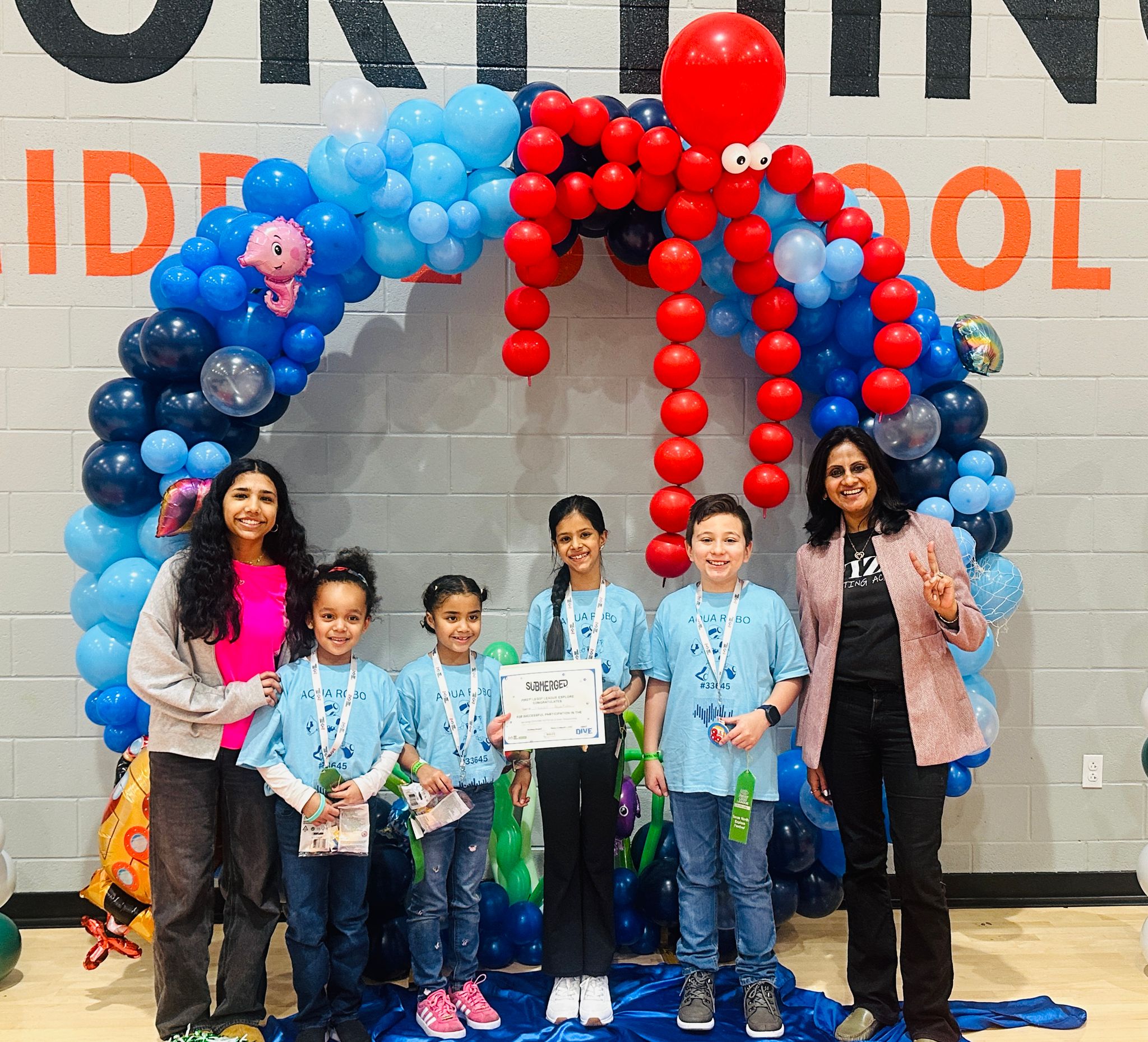 First LEGO League Submerged Awards Award, picture with the students